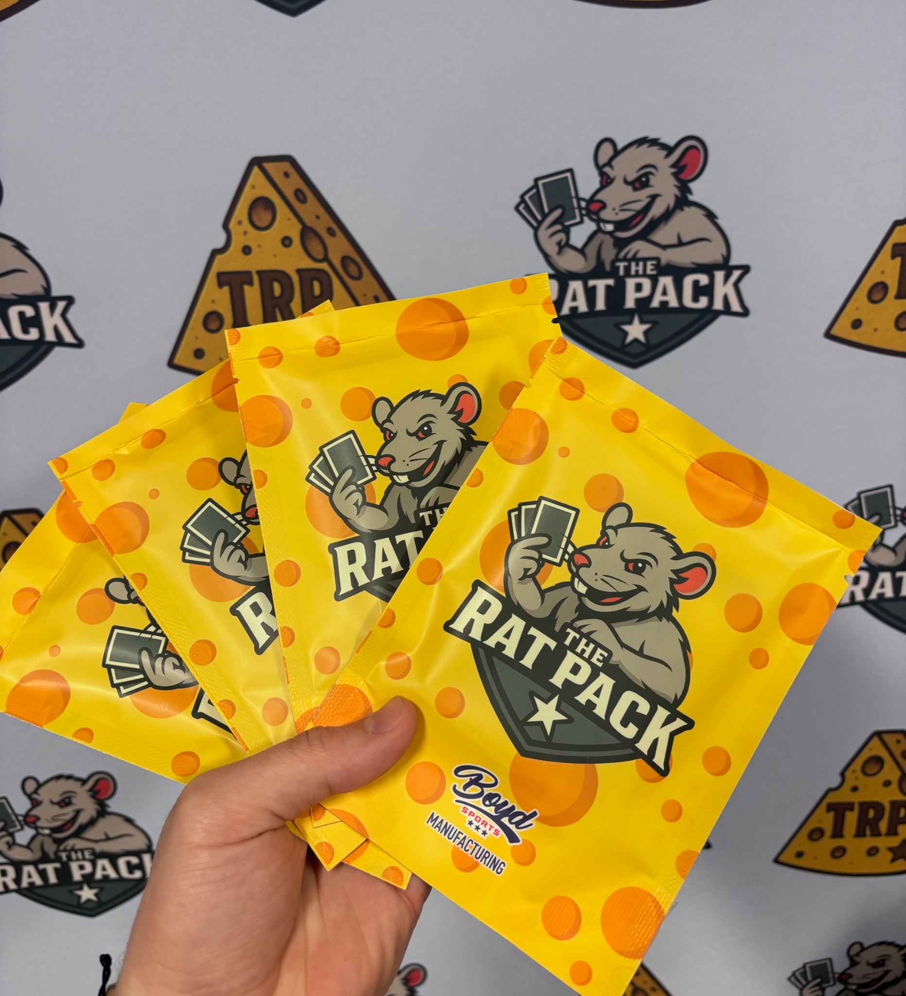 Yellow Ratpack sports card packs